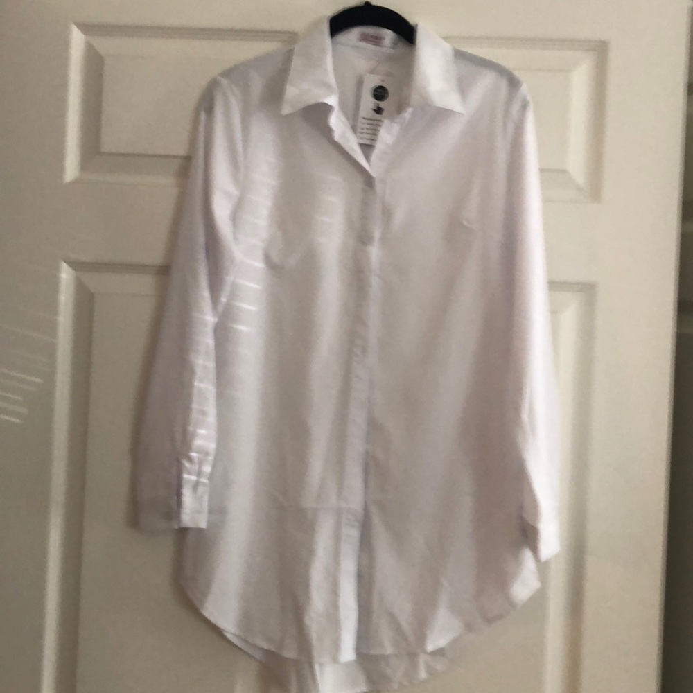 Brand new white button down shirt. Longer length